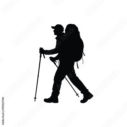 Silhouette of a hiker with backpack and trekking poles walking outdoors