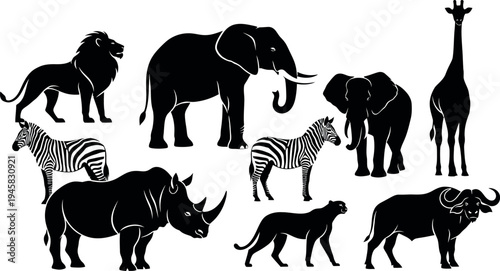Silhouette of various african animals including elephant zebra and giraffe in black on white background silhouette