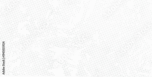 Artistic grunge halftone design with soft fading and scattered dots for creative projects.