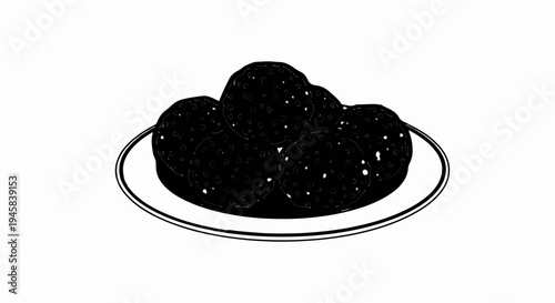 Stacked dark, textured circular food items on a white plate