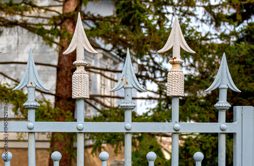 iron spear heads at a garden fence of a villa in the spa community of Bath Voeslau in Lower Austria