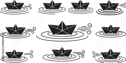 Black paper boats floating on water in minimalist style