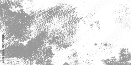 Gray distressed texture with rough brush strokes and speckled patterns on white background