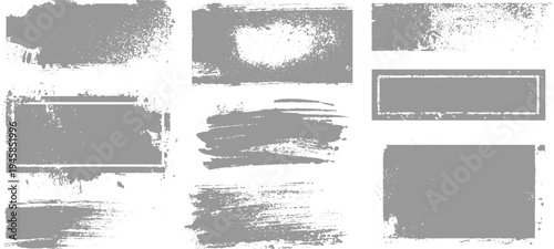 Collection of nine distressed grey rectangular frames and brush stroke on white background texture