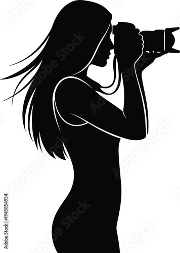 Male photographer silhouette crouching with camera and flash taking photo of young female model standing in studio isolated on white.