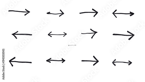 A minimalist image featuring two brushstroke-style arrows pointing to the left. Ideal for concepts relating to direction, movement, or choices.