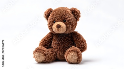 Adorable Fluffy Brown Teddy Bear Sitting Isolated on White Background.
