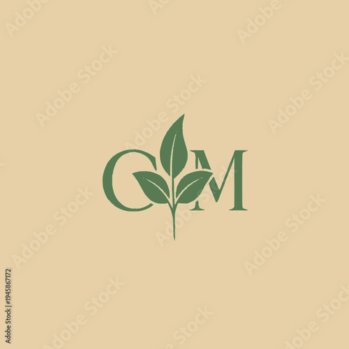 Green Logo with Leaves and Letters.