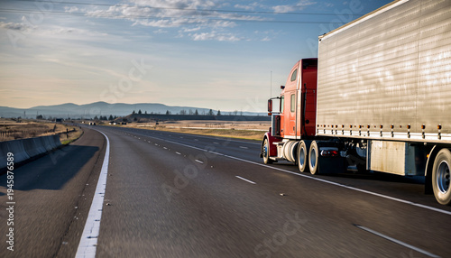 True american classic big rig semi truck with semi trailer riding interstate