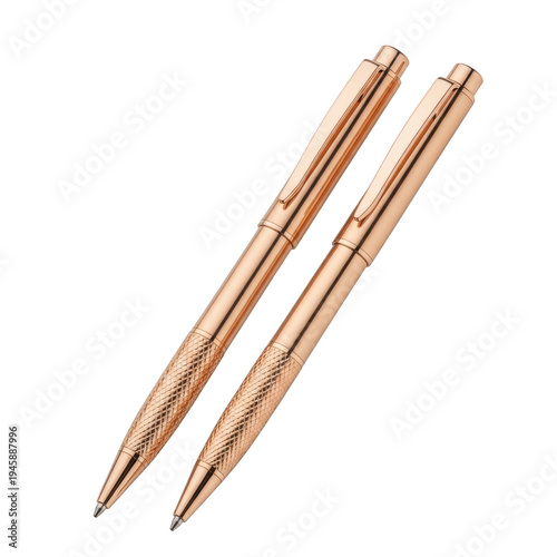 Two gold-tone metal pencils with hexagonal barrels and pointed tips