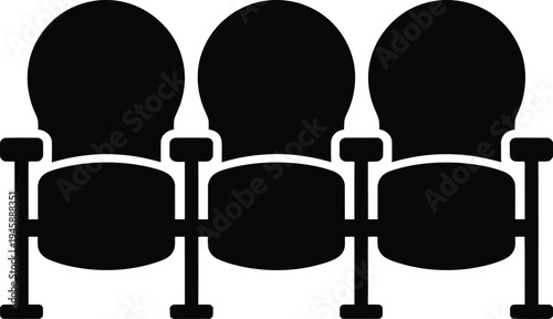 Three empty theater seats arranged side by side in a row.