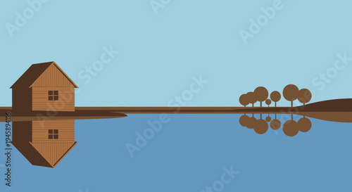 Tranquil lake scene wooden cabin reflecting in calm waters under blue sky