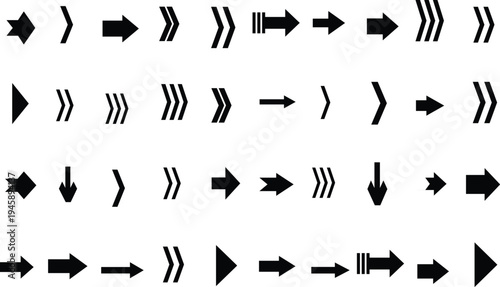 An assortment of black navigation arrows with varied designs and orientations against a bright white surface