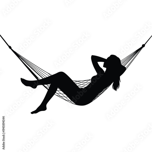 Silhouette of a woman relaxing in a hammock on a bright background