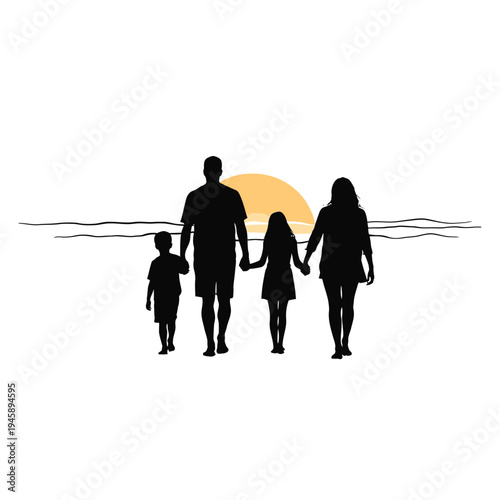 Silhouetted family of four walking along a beach at sunset