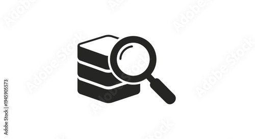 Magnifying glass on book stack.