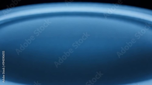Abstract blue light background with smooth oval motion and gentle glow effect for creative projects