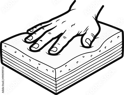 Hand pressing down on a multi-layered, perforated cushion