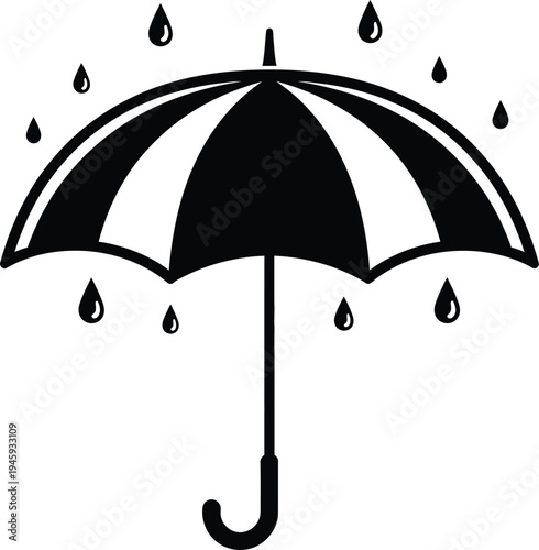A classic black and white striped umbrella shielding from falling raindrops