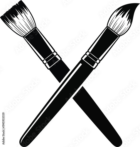 Two crossed paintbrushes with fluffy bristles against a plain background.