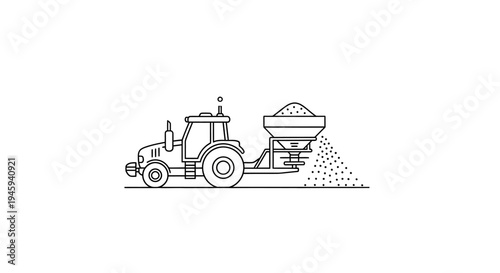 Tractor spreading material on ground.