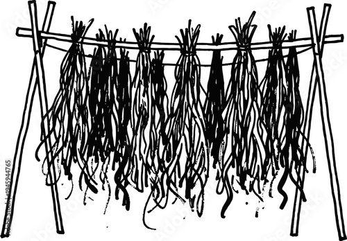 seaweed drying on a wooden rack outdoors natural harvesting and food preparation process