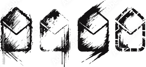 four grunge envelopes with rough brush stroke edges and textured design