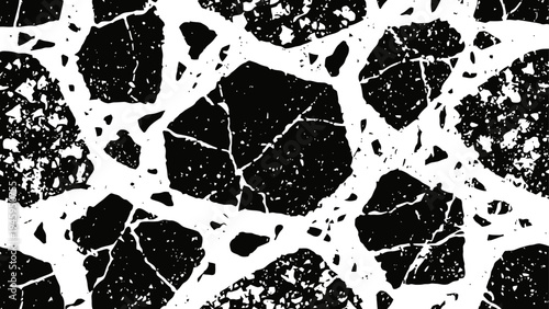 Black and white terrazzo pattern with irregular stone shapes and textured surfaces