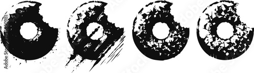 Set of four bitten chocolate donuts with sprinkles and icing on a white background