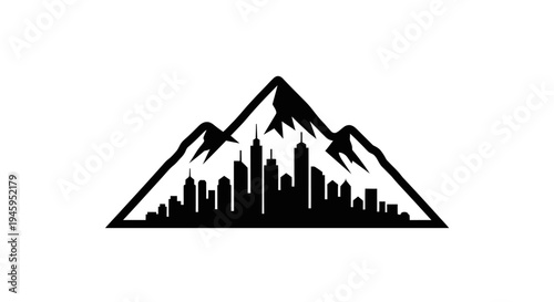 City skyline with mountain range silhouette.