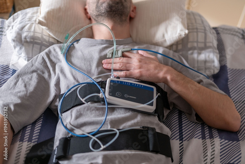 Tableau sur toile male Patient undergoing clinical sleep study diagnostic sensors, man sleeping wi