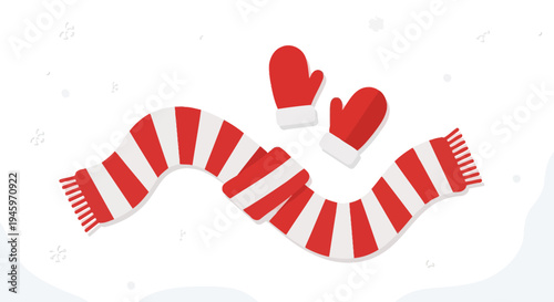 Festive red striped scarf and matching red mittens surrounded by snowflakes on an isolated white background.