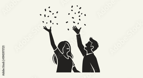 Silhouette of happy couple throwing confetti.