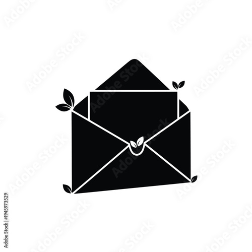 Black envelope with green leaf decorations tied with a string