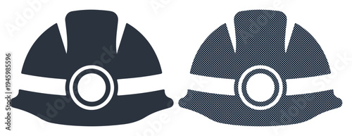 Two dark blue hard hats with reflective bands and headlamps, symbolizing safety and protection in construction.