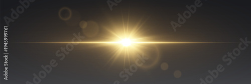 Golden sun lens flare with horizontal light beam on dark background.