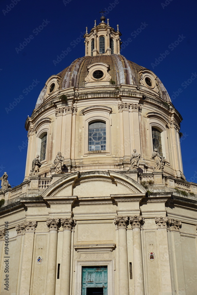 Obraz premium Vertical close up of the Renaissance architecture dome, cupola of the landmark Santa Maria di Loreto Catholic church in Rome, Italy