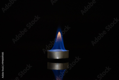 Fotografie Ethanol Flame Test – Colorful Chemical Reaction on Black Background