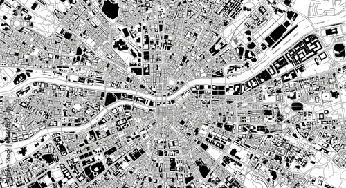 Detailed Aerial View of a City with River and Dense Urban Fabric.