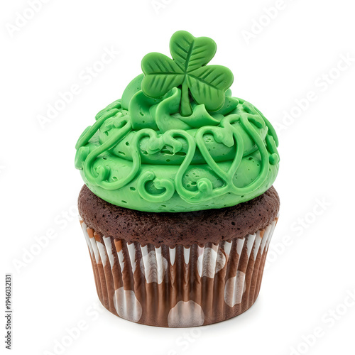 A chocolate cupcake with green frosting and a shamrock on top for st patricks day