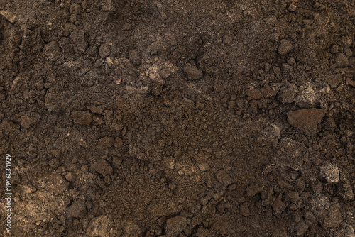 Photos Brown dark soil ground abstract texture background with copyspace top view