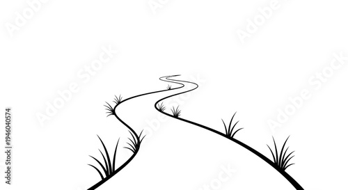 Winding road through serene landscape with grassy hills