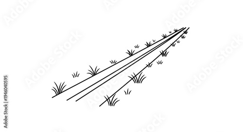 Railway tracks disappearing into distance with grassy landscape