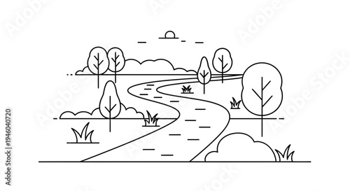 Serene landscape with winding road and trees at sunset