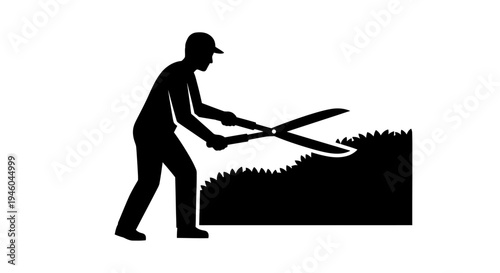 Man cutting grass with large scissors.