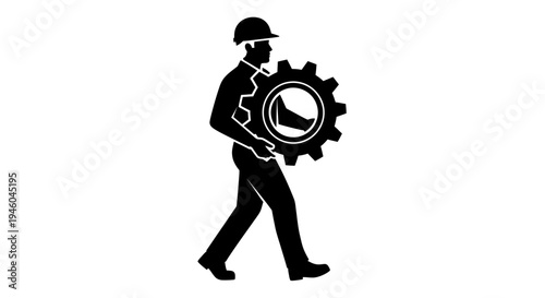 Man holding large gear wheel.