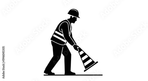 Man wearing safety vest holding traffic cone.