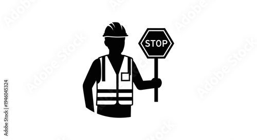 Construction worker holding stop sign.