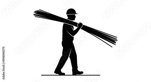 Man carrying a large bundle lumber.
