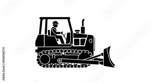 Bulldozer with operator in cabin.